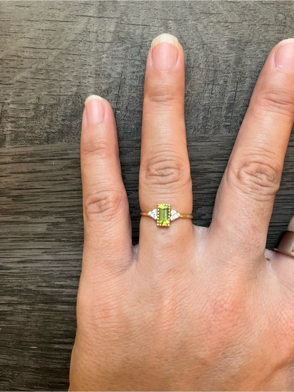 Gold Ring with Light Green Peridot Center Stone